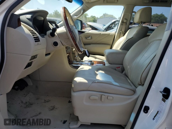 2016 Infiniti QX80 with VIN JN8AZ2NE5G9121014, listed as a Copart auction lot 60242204 with 118,575 mi miles and Salvage Title. Bid and sale history available at carsss.com. Image 7.
