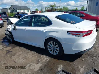 2019 Toyota Camry LE with VIN 4T1B11HK2KU187475, listed as a IAAI auction lot 42192293 with 44,413 mi miles and . Bid and sale history available at DreamBid. Image 3.