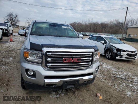 2019 GMC Canyon 4WD SLT with VIN 1GTG6DEN7K1134168, listed as a Copart auction lot 86510834 with 61,889 mi miles and Salvage Title. Bid and sale history available at carsss.com. Image 5.