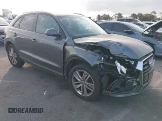 2018 Audi Q3 Premium with VIN WA1ECCFS1JR002824, listed as a IAAI auction lot 41696572 with 35,612 mi miles. Bid and sale history available at carsss.com. Image 1.