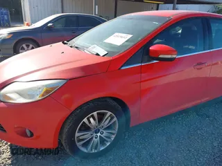 2012 Ford Focus SEL with VIN 1FAHP3M20CL393440, listed as a IAAI auction lot 42015692 with 198,214 mi miles. Bid and sale history available at carsss.com. Image 6.