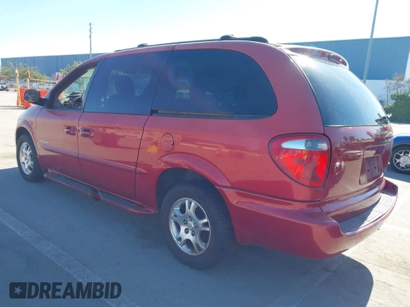 2001 Dodge Grand Caravan with VIN 2B4GT44L31R196487, listed as a IAAI auction lot 41762495 with 164,571 mi miles and . Bid and sale history available at DreamBid. Image 3.