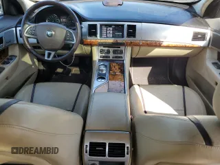 2015 Jaguar XF V6 Portfolio with VIN SAJWJ0FFXF8U60040, listed as a Copart auction lot 52912695 with 112,618 mi miles and Salvage Title. Bid and sale history available at carsss.com. Image 8.