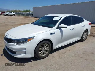 2016 Kia Optima LX with VIN KNAGT4L30G5117719, listed as a IAAI auction lot 42449051 with 122,597 mi miles and . Bid and sale history available at DreamBid. Image 2.