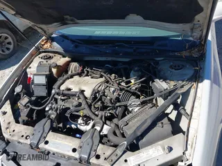 2004 Chevrolet Impala with VIN 2G1WF52E249310976, listed as a IAAI auction lot 41847736 with 296,477 mi miles. Bid and sale history available at carsss.com. Image 10.