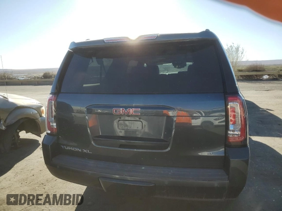 2019 GMC Yukon XL SLT with VIN 1GKS2GKC3KR296430, listed as a Copart auction lot 49179235 with 41,647 mi miles and Salvage title. Bid and sale history available at DreamBid. Image 6.