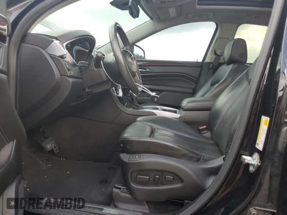 2015 Cadillac SRX Premium Collection with VIN 3GYFNDE32FS572480, listed as a Copart auction lot 54456725 with 82,573 mi miles and Salvage title. Bid and sale history available at DreamBid. Image 7.