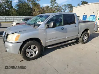 2006 Nissan Titan SE z VIN 1N6BA07B46N503438, wystawiony jako Copart lot #75015664 z przebiegiem 217 456 mil mil oraz Szkoda całkowita • Salvage title. Historia ofert i sprzedaży dostępna na DreamBid. Obrazek 1.