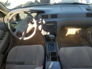 2000 Toyota Camry CE z VIN 4T1BG22K7YU738912, wystawiony jako Copart lot #88852845 z przebiegiem 122 569 mil mil oraz Szkoda całkowita • Salvage title. Historia ofert i sprzedaży dostępna na DreamBid. Obrazek 8.
