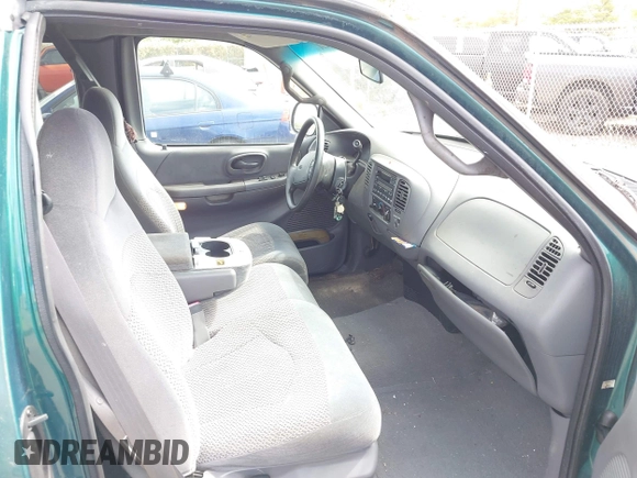 2000 Ford F-150 XL with VIN 2FTRX17W3YCA66727, listed as a IAAI auction lot 42639201 with 42,094 mi miles and . Bid and sale history available at DreamBid. Image 5.