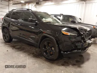 2016 Jeep Cherokee Latitude with VIN 1C4PJMCS9GW162734, listed as a IAAI auction lot 41940086 with 98,101 mi miles and . Bid and sale history available at carsss.com. Image 1.