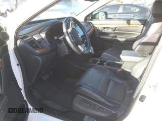 2017 Honda CR-V Touring with VIN 2HKRW1H96HH517669, listed as a IAAI auction lot 41653040 with 97,961 mi miles. Bid and sale history available at carsss.com. Image 20.