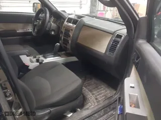 2010 Mercury Mariner with VIN 4M2CN9BG0AKJ06493, listed as a IAAI auction lot 41199173 with 143,631 mi miles. Bid and sale history available at carsss.com. Image 5.
