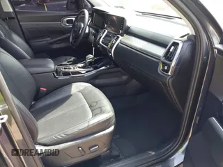 2023 Kia Sorento SX z VIN 5XYRK4LF0PG171635, wystawiony jako IAAI lot #42116649 z przebiegiem 75 348 mil mil oraz . Historia ofert i sprzedaży dostępna na DreamBid. Obrazek 5.