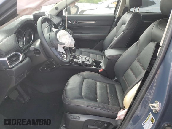 2024 Mazda CX-5 S Carbon Edition z VIN JM3KFBCL2R0521170, wystawiony jako Copart lot #53203485 z przebiegiem Nie podano mil oraz Nie do naprawy. Historia ofert i sprzedaży dostępna na DreamBid. Obrazek 7.