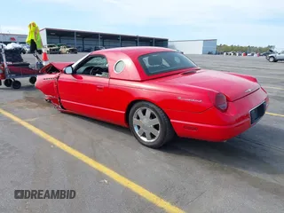 2002 Ford Thunderbird Hardtop Premium with VIN 1FAHP60A02Y130882, listed as a IAAI auction lot 41911737 with 18,521 mi miles and . Bid and sale history available at DreamBid. Image 3.