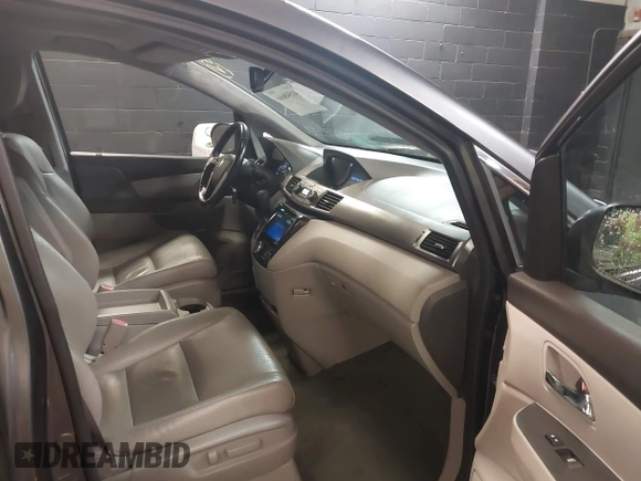 2016 Honda Odyssey EX-L with VIN 5FNRL5H61GB138100, listed as a IAAI auction lot 41548666 with 127,780 mi miles. Bid and sale history available at carsss.com. Image 5.
