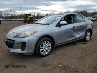 2012 Mazda 3 i Grand Touring with VIN JM1BL1W81C1700806, listed as a Copart auction lot 50958275 with 196,974 mi miles and Salvage Title. Bid and sale history available at carsss.com. Image 1.