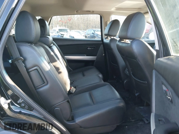 2014 Mazda CX-9 Grand Touring with VIN JM3TB3DV4E0444558, listed as a IAAI auction lot 41538130 with 113,050 mi miles and . Bid and sale history available at DreamBid. Image 8.