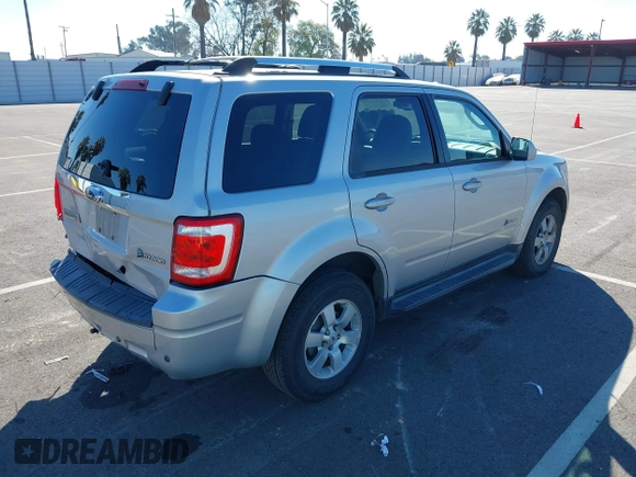 2009 Ford Escape Hybrid with VIN 1FMCU59349KA94375, listed as a IAAI auction lot 41865743 with 127,538 mi miles and . Bid and sale history available at DreamBid. Image 4.