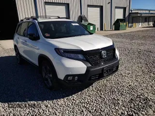 2020 Honda Passport Touring z VIN 5FNYF8H9XLB008647, wystawiony jako Copart lot #73320804 z przebiegiem 70 068 mil mil oraz Szkoda całkowita • Salvage title. Historia ofert i sprzedaży dostępna na DreamBid. Obrazek 11.