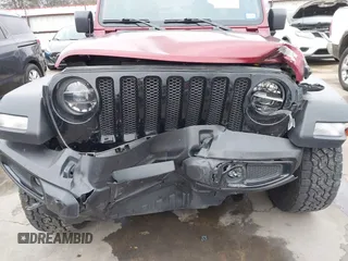 2021 Jeep Wrangler Unlimited Sport S with VIN 1C4HJXDN9MW777830, listed as a IAAI auction lot 41625934 with 42,251 mi miles and . Bid and sale history available at DreamBid. Image 17.