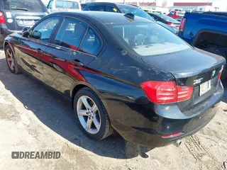 2014 BMW 3 Series 328d xDrive with VIN WBA3D5C54EF147199, listed as a IAAI auction lot 41626737 with 98,281 mi miles. Bid and sale history available at carsss.com. Image 3.