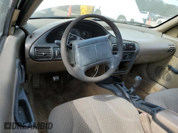 1996 Chevrolet Cavalier z VIN 1G1JC1240TM132439, wystawiony jako Copart lot #56125415 z przebiegiem 352 952 mil mil oraz Szkoda całkowita • Salvage title. Historia ofert i sprzedaży dostępna na DreamBid. Obrazek 8.