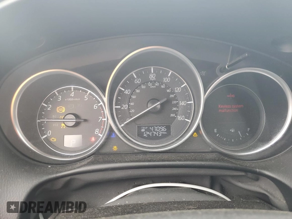 2016 Mazda CX-5 Grand Touring z VIN JM3KE2DY5G0676290, wystawiony jako Copart lot #54155325 z przebiegiem 124 743 mil mil oraz Szkoda całkowita • Salvage title. Historia ofert i sprzedaży dostępna na DreamBid. Obrazek 9.