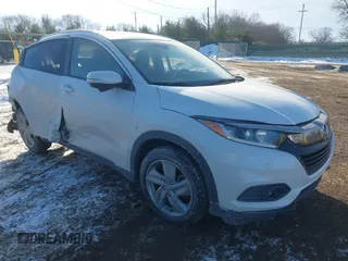 2020 Honda HR-V EX with VIN 3CZRU6H55LM731842, listed as a IAAI auction lot 41408491 with 74,088 mi miles. Bid and sale history available at carsss.com. Image 1.