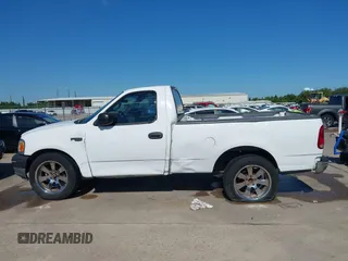 2000 Ford F-150 with VIN 1FTZF1728YKA54035, listed as a IAAI auction lot 42236191 with Not provided miles and . Bid and sale history available at DreamBid. Image 14.