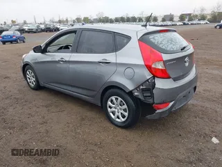 2014 Hyundai Accent GS with VIN KMHCT5AE3EU176306, listed as a IAAI auction lot 41572325 with 179,277 mi miles and . Bid and sale history available at carsss.com. Image 3.