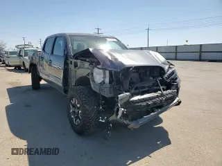 2023 Toyota Tacoma SR5 z VIN 3TMDZ5BN7PM140616, wystawiony jako Copart lot #51951945 z przebiegiem 30 274 mil mil oraz Szkoda całkowita • Salvage title. Historia ofert i sprzedaży dostępna na DreamBid. Obrazek 10.