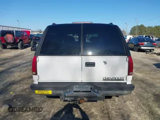 1996 Chevrolet Suburban with VIN 3GNFK16RXTG135350, listed as a IAAI auction lot 41482918 with 157,971 mi miles. Bid and sale history available at carsss.com. Image 16.