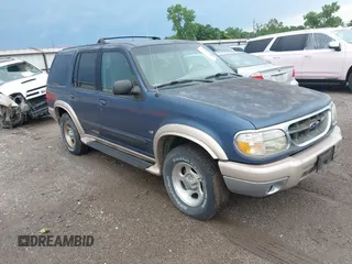 2000 Ford Explorer z VIN 1FMZU64PXYZA85549, wystawiony jako IAAI lot #42439504 z przebiegiem 141 315 mil mil oraz . Historia ofert i sprzedaży dostępna na DreamBid. Obrazek 1.
