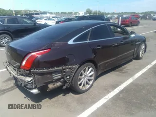 2011 Jaguar XJ with VIN SAJWA1CB5BLV09952, listed as a IAAI auction lot 41435624 with 114,892 mi miles and . Bid and sale history available at DreamBid. Image 4.