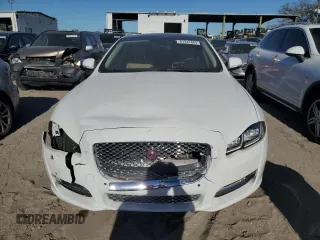 2016 Jaguar XJ Portfolio with VIN SAJWA2G72G8W00103, listed as a Copart auction lot 81347664 with 45,917 mi miles and Salvage title. Bid and sale history available at DreamBid. Image 5.