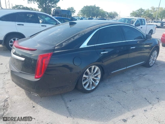 2016 Cadillac XTS Luxury Collection with VIN 2G61M5S35G9137936, listed as a IAAI auction lot 41969771 with 1 mi miles. Bid and sale history available at carsss.com. Image 4.
