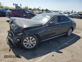 2018 Mercedes-Benz E 300 with VIN WDDZF4JBXJA392998, listed as a Copart auction lot 50063445 with 98,232 mi miles and Salvage title. Bid and sale history available at DreamBid. Image 1.
