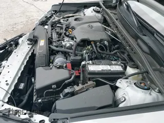 2024 Toyota Camry SE z VIN 4T1G11AK0RU200816, wystawiony jako IAAI lot #43338513 z przebiegiem 34 470 mil mil oraz . Historia ofert i sprzedaży dostępna na DreamBid. Obrazek 19.