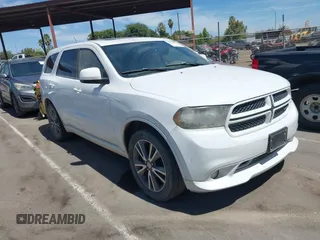 2013 Dodge Durango SXT with VIN 1C4RDHAG4DC673948, listed as a IAAI auction lot 42849951 with 176,860 mi miles and . Bid and sale history available at DreamBid. Image 1.