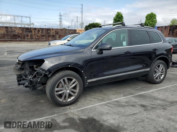 2016 Volkswagen Touareg Sport с VIN WVGEF9BP3GD011138, выставлен на аукционе Copart как лот 53557195 с пробегом 75 825 миль миль и Списание • Salvage title. История ставок и продаж доступна на DreamBid. Изображение 1.