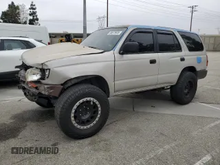 1998 Toyota 4Runner with VIN JT3GM84R9W0032842, listed as a Copart auction lot 50613935 with 266,141 mi miles and Salvage title. Bid and sale history available at DreamBid. Image 1.