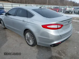 2015 Ford Fusion Titanium with VIN 3FA6P0D95FR103444, listed as a IAAI auction lot 41411473 with 213,729 mi miles. Bid and sale history available at carsss.com. Image 3.