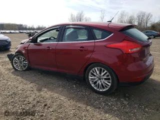 2015 Ford Focus Titanium with VIN 1FADP3N28FL217558, listed as a Copart auction lot 49910455 with 96,582 mi miles and Salvage Title. Bid and sale history available at carsss.com. Image 2.
