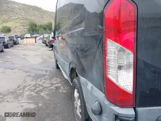 2015 Ford Transit Cargo Van with VIN 1FTYR2CM5FKA84493, listed as a IAAI auction lot 42009809 with 116,379 mi miles. Bid and sale history available at carsss.com. Image 21.