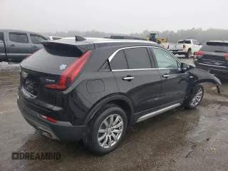 2019 Cadillac XT4 FWD Premium Luxury with VIN 1GYFZCR47KF152164, listed as a Copart auction lot 44705115 with 99,115 mi miles and Salvage Title. Bid and sale history available at carsss.com. Image 3.