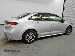 2021 Toyota Corolla Hybrid LE with VIN JTDEAMDE4MJ009929, listed as a Copart auction lot 59626985 with 91,817 mi miles and Clean title. Bid and sale history available at DreamBid. Image 3.