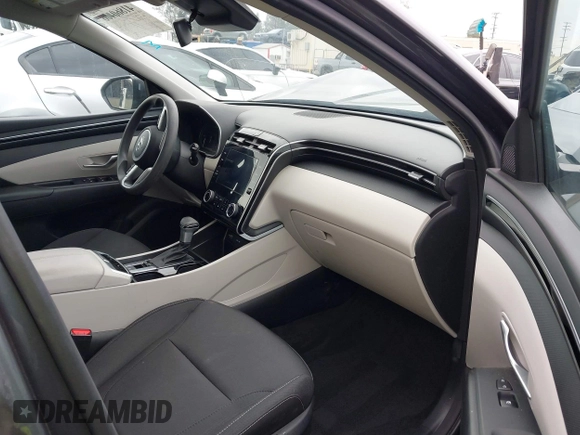 2023 Hyundai Tucson SEL z VIN KM8JBCAE9PU242486, wystawiony jako IAAI lot #41860406 z przebiegiem 25 294 mil mil oraz . Historia ofert i sprzedaży dostępna na DreamBid. Obrazek 5.