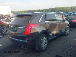 2019 Cadillac XT5 Luxury FWD z VIN 1GYKNCRS2KZ251207, wystawiony jako IAAI lot #42066271 z przebiegiem 128 226 mil mil oraz . Historia ofert i sprzedaży dostępna na DreamBid. Obrazek 4.